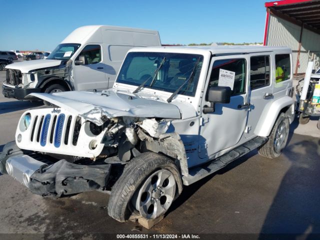 1C4BJWEGXEL195786 Jeep Wrangler Unlimited Sahara