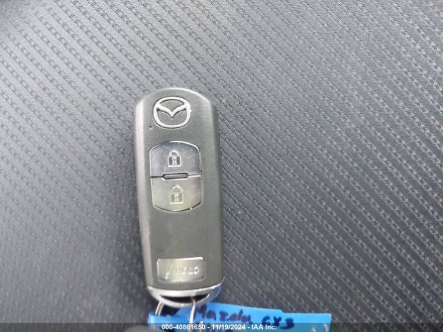JM1DKFC70K1401519 Mazda Cx-3 Touring