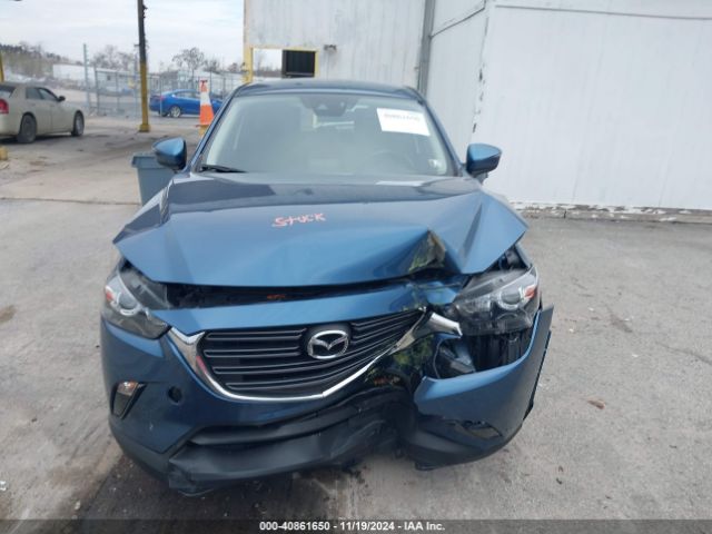 JM1DKFC70K1401519 Mazda Cx-3 Touring