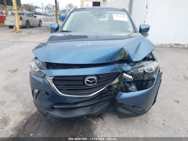 JM1DKFC70K1401519 Mazda Cx-3 Touring