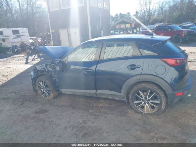 JM1DKFC77H0174019 Mazda Cx-3 Touring