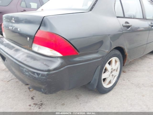 2002 MITSUBISHI LANCER JA3AJ36E42U052117 Photo 5
