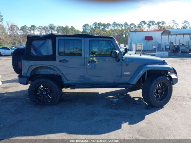 1C4BJWEG1EL322327 Jeep Wrangler Unlimited Sahara