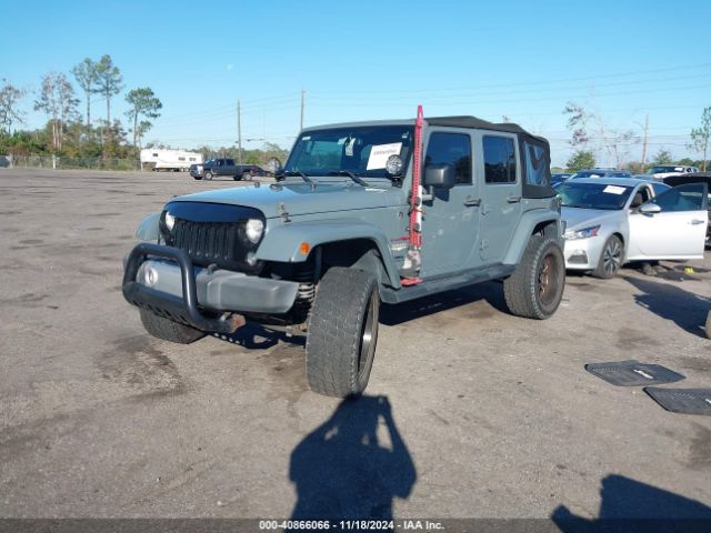 1C4BJWEG1EL322327 Jeep Wrangler Unlimited Sahara