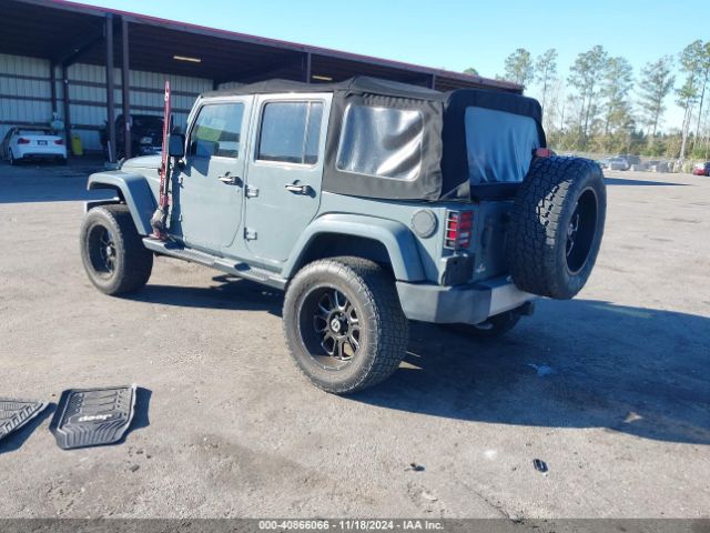 1C4BJWEG1EL322327 Jeep Wrangler Unlimited Sahara