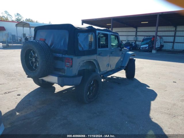 1C4BJWEG1EL322327 Jeep Wrangler Unlimited Sahara