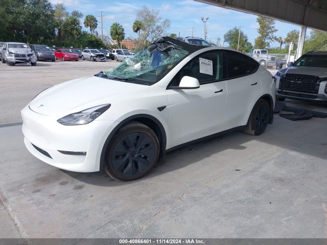 2024 TESLA MODEL Y 7SAYGAEE0RF100657 Photo 1