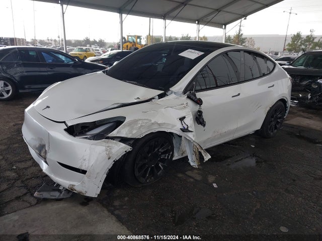 2024 TESLA MODEL Y 7SAYGDEDXRF108967 Photo 1