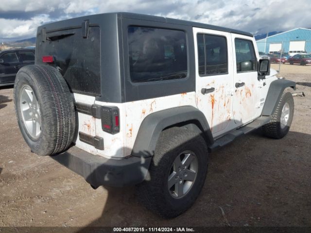 1C4BJWDG0EL233074 Jeep Wrangler Unlimited Sport