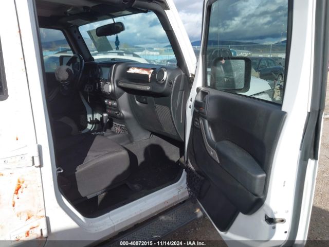 1C4BJWDG0EL233074 Jeep Wrangler Unlimited Sport