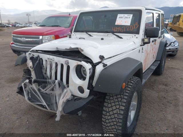 1C4BJWDG0EL233074 Jeep Wrangler Unlimited Sport