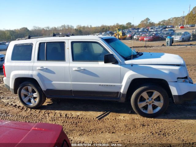 1C4NJPFA2ED698557 Jeep Patriot Latitude