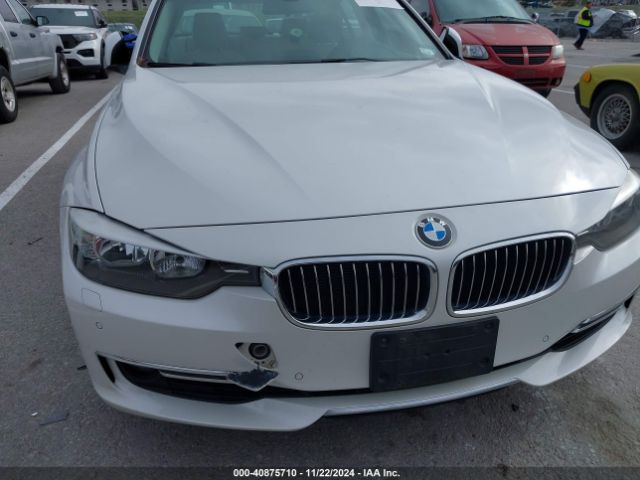 WBA3B3C59FJ985043 BMW 328i Xdrive