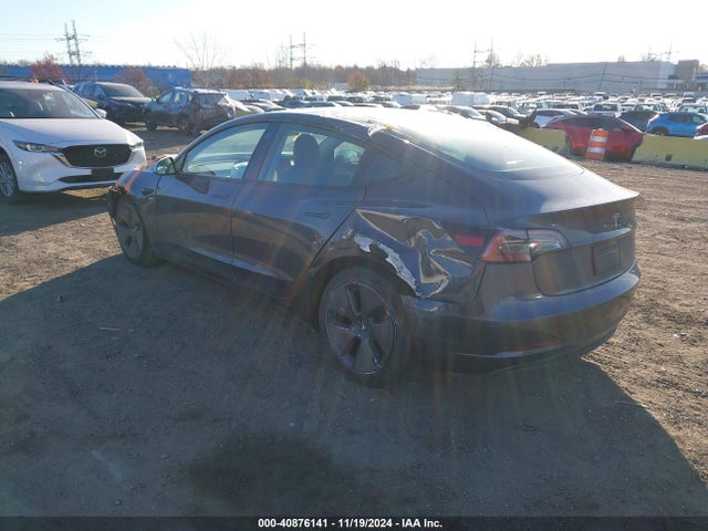 2023 TESLA MODEL 3 5YJ3E1EA9PF652262 Photo 2