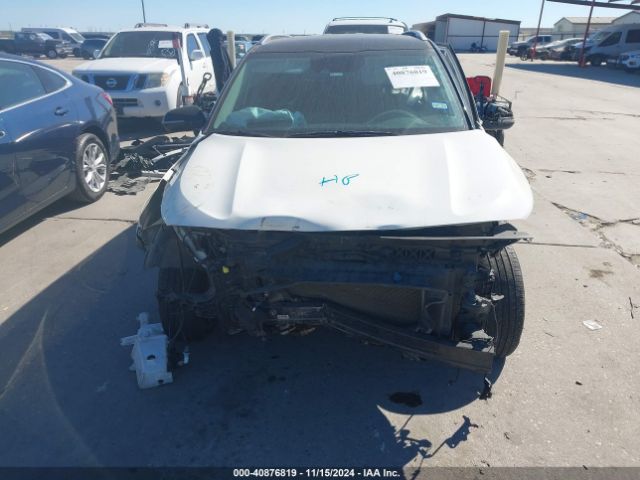 KNDEUCAAXM7220584 KIA SELTOS S