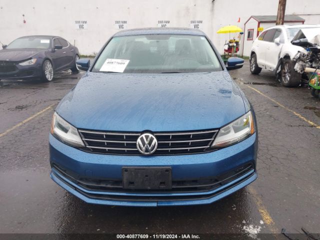 3VWDB7AJ2JM262836 Volkswagen Jetta 1.4t Se/1.4t Wolfsburg Edition