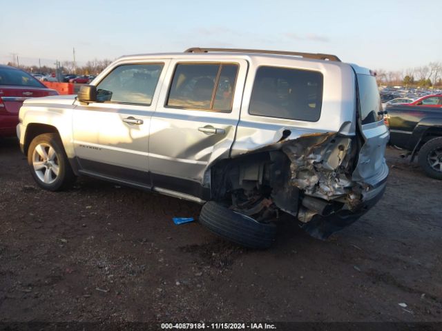 1C4NJRFB7ED509292 Jeep Patriot Latitude