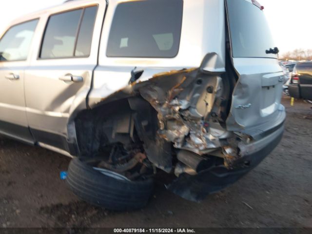 1C4NJRFB7ED509292 Jeep Patriot Latitude
