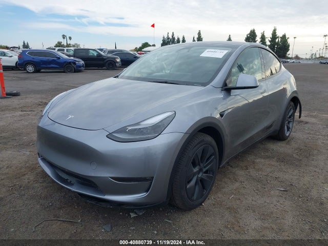 2024 TESLA MODEL Y 7SAYGDEE1RA312143 Photo 1
