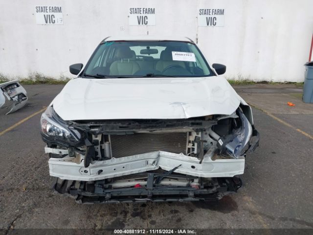 4S3GTAA69K3704245 Subaru Impreza 2.0i