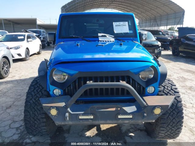 1C4BJWDG4FL506969 Jeep Wrangler Unlimited Sport