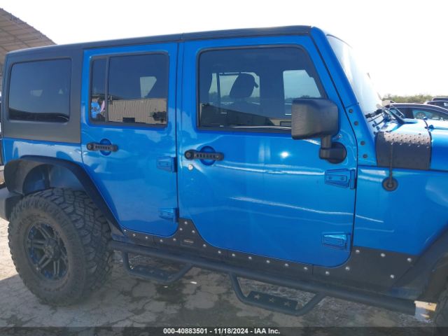 1C4BJWDG4FL506969 Jeep Wrangler Unlimited Sport