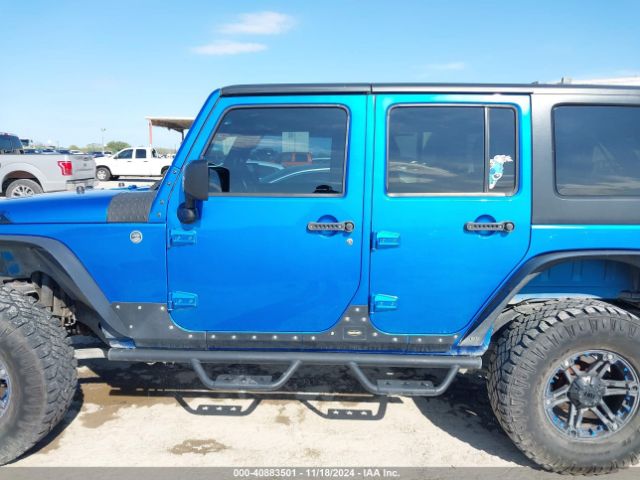 1C4BJWDG4FL506969 Jeep Wrangler Unlimited Sport