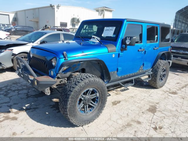 1C4BJWDG4FL506969 Jeep Wrangler Unlimited Sport