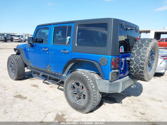 1C4BJWDG4FL506969 Jeep Wrangler Unlimited Sport
