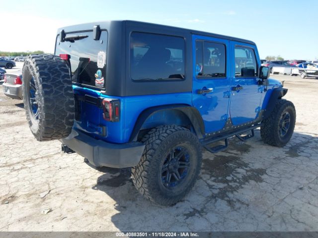 1C4BJWDG4FL506969 Jeep Wrangler Unlimited Sport