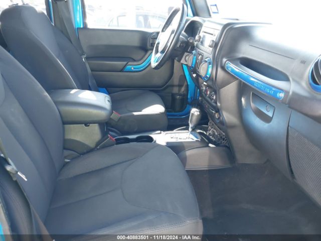 1C4BJWDG4FL506969 Jeep Wrangler Unlimited Sport