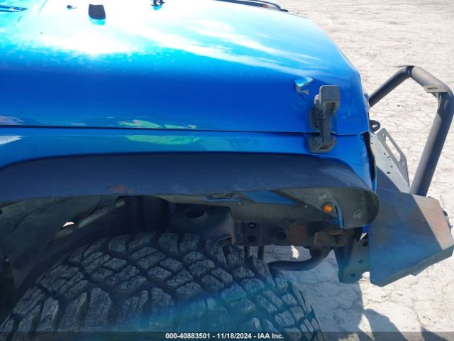 1C4BJWDG4FL506969 Jeep Wrangler Unlimited Sport
