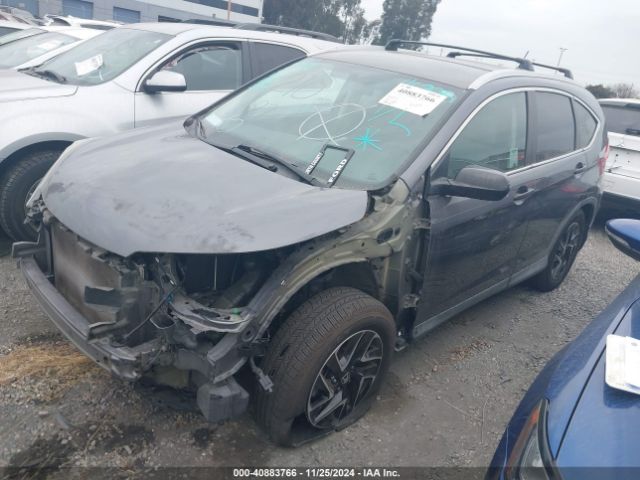 2HKRM3H40GH569819 Honda CR-V SE
