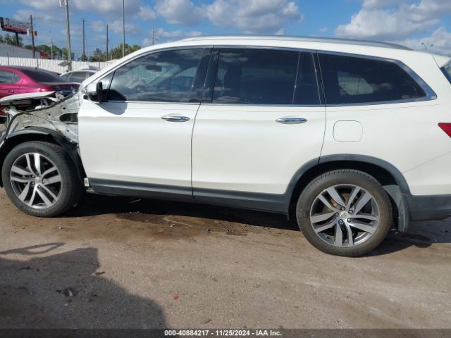 5FNYF6H94HB044328 Honda Pilot Touring