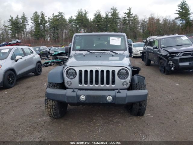 1C4BJWDG5EL171252 Jeep Wrangler Unlimited Sport