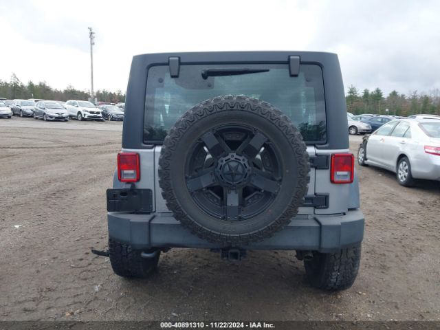 1C4BJWDG5EL171252 Jeep Wrangler Unlimited Sport