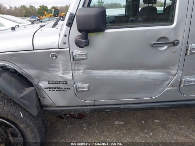 1C4BJWDG5EL171252 Jeep Wrangler Unlimited Sport