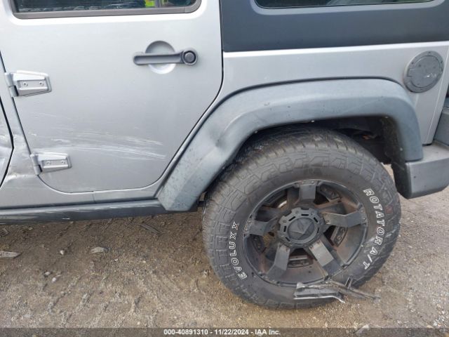 1C4BJWDG5EL171252 Jeep Wrangler Unlimited Sport