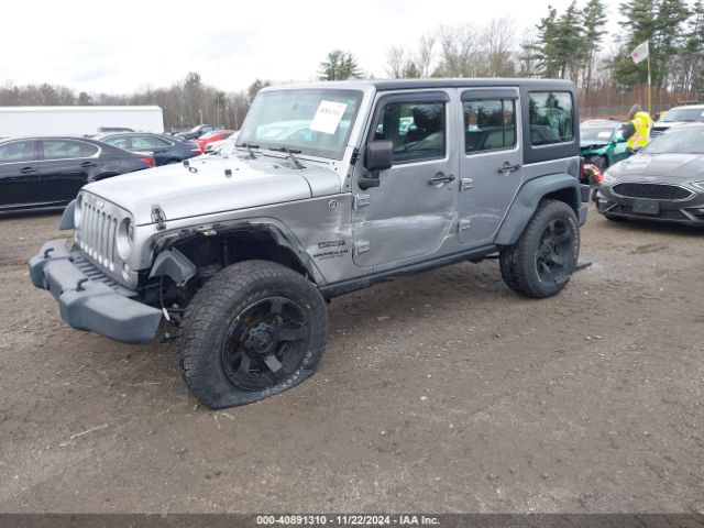 1C4BJWDG5EL171252 Jeep Wrangler Unlimited Sport
