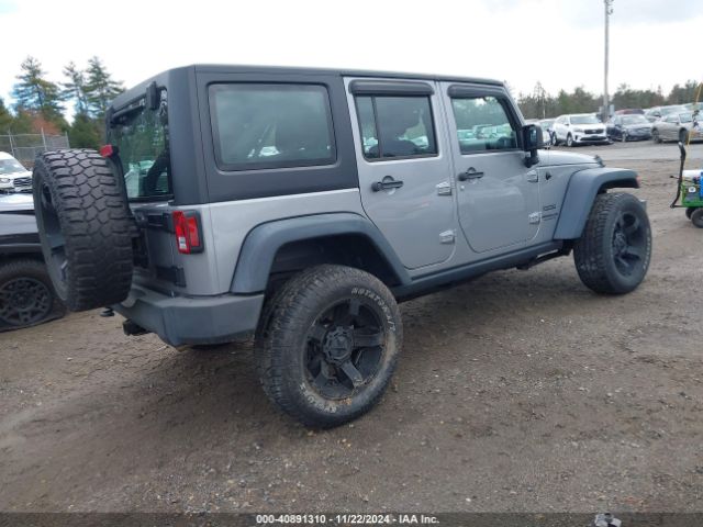 1C4BJWDG5EL171252 Jeep Wrangler Unlimited Sport