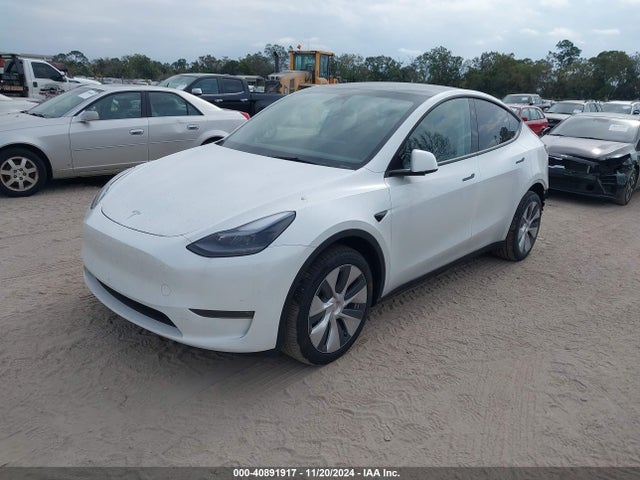 2024 TESLA MODEL Y 7SAYGDEE9RA276959 Photo 1