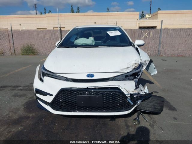 JTDBCMFE8R3062977 Toyota Corolla Hybrid Se