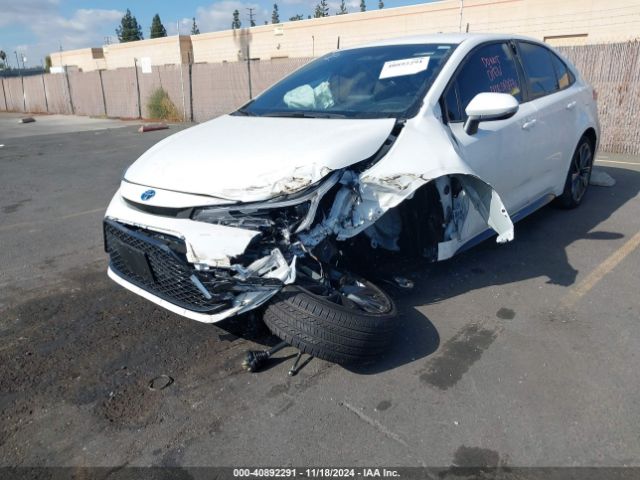 JTDBCMFE8R3062977 Toyota Corolla Hybrid Se