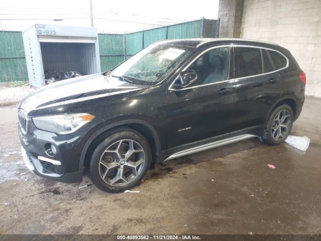 2018 BMW X1 WBXHU7C38J5H42467 Photo 1