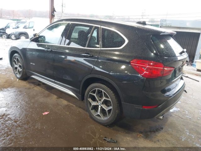 2018 BMW X1 WBXHU7C38J5H42467 Photo 2