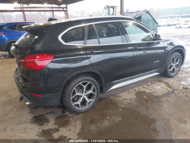 2018 BMW X1 WBXHU7C38J5H42467 Photo 3