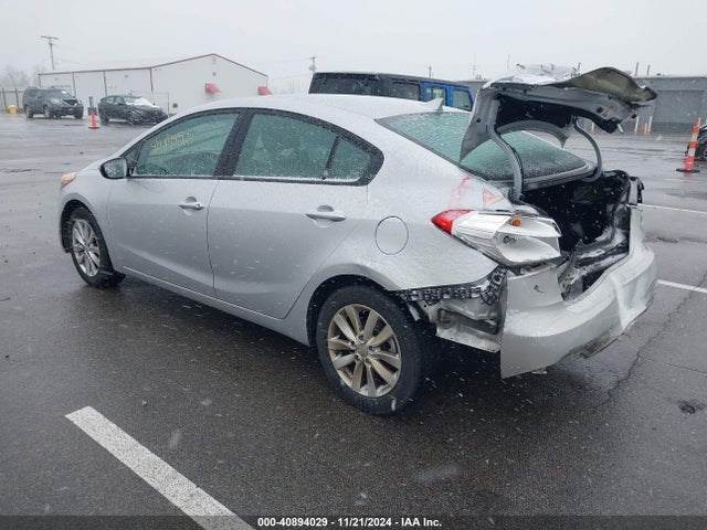 KNAFX4A69E5209597 KIA FORTE LX