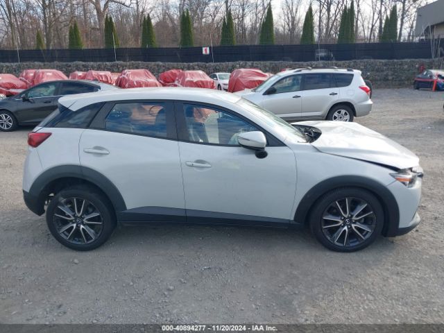 JM1DKFC75J0315109 Mazda Cx-3 Touring