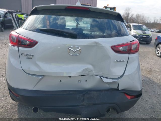 JM1DKFC75J0315109 Mazda Cx-3 Touring