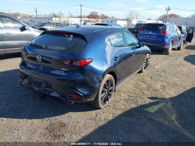 JM1BPBNM8L1160377 Mazda Mazda3 Premium Package